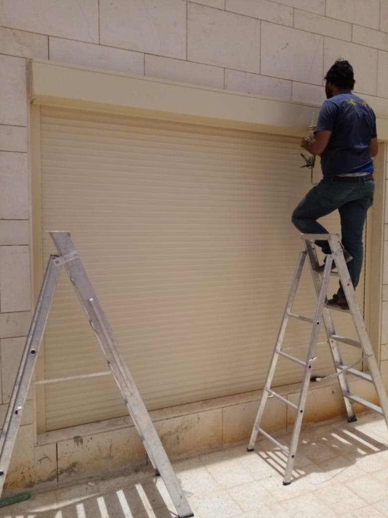 أعمال تركيب باب كراج ألمنيوم